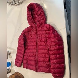 Ultra light down puffy jacket by Uni qlo in size large.